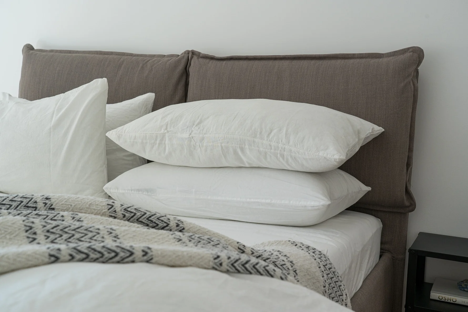 Layered bedding with sheets pillows quilt and duvet